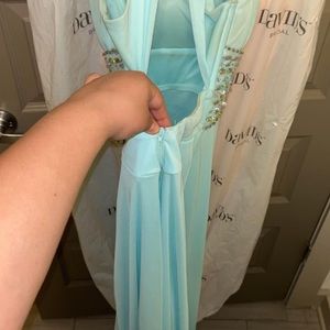 - Rhinestones
- Long, flowy, shimmery silver bottom with built in bra